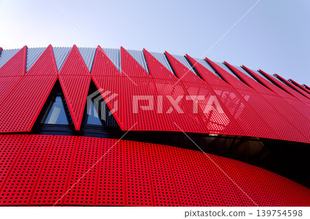 Exterior view of Horacka multifunctional arena in Jihlava, Vysocina region, Czechia, on a sunny day, showing modern architecture from open public surroundings Exterior view of Horacka multifunctional arena in Jihlava, Vysocina region, Czechia, on a sunny day, showing modern architecture from open public surroundings 139754598