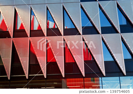 Exterior view of Horacka multifunctional arena in Jihlava, Vysocina region, Czechia, on a sunny day, showing modern architecture from open public surroundings Exterior view of Horacka multifunctional arena in Jihlava, Vysocina region, Czechia, on a sunny day, showing modern architecture from open public surroundings 139754605