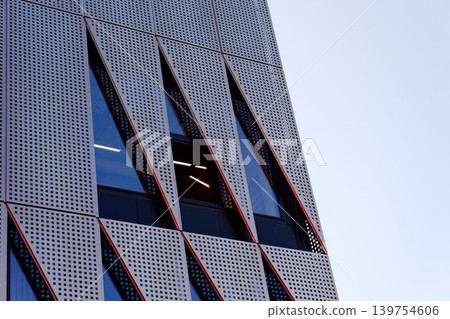 Exterior view of Horacka multifunctional arena in Jihlava, Vysocina region, Czechia, on a sunny day, showing modern architecture from open public surroundings Exterior view of Horacka multifunctional arena in Jihlava, Vysocina region, Czechia, on a sunny day, showing modern architecture from open public surroundings 139754606