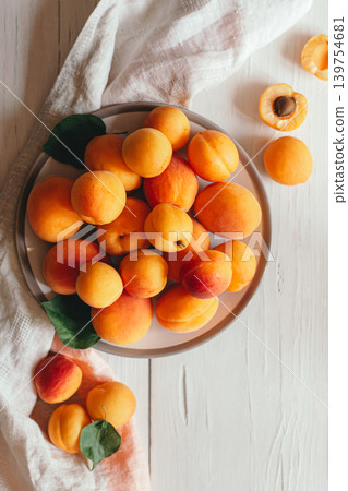 Ripe apricots on a plate. Ripe apricots on a plate. 139754681