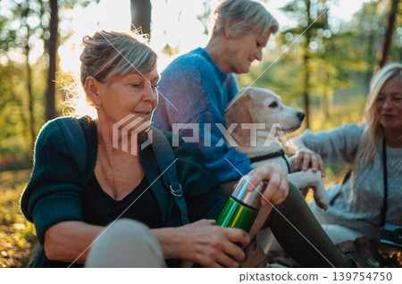 Elderly female friendship drinking coffee in nature. 139754750