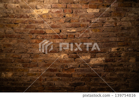 Close-Up of Rustic Weathered Brick Wall Texture 139754816