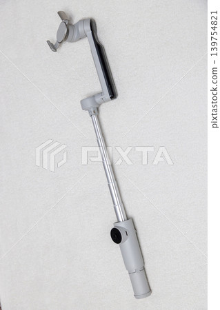 Gray Foldable Phone Gimbal Stabilizer with Telescopic Arm Gray Foldable Phone Gimbal Stabilizer with Telescopic Arm 139754821