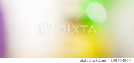 Soft white and green bokeh abstract background with yellow and purple accent tones and copy space Soft white and green bokeh abstract background with yellow and purple accent tones and copy space 139754904