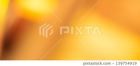 Warm golden abstract background with honey yellow and amber blurred gradient for cozy autumn backdrop Warm golden abstract background with honey yellow and amber blurred gradient for cozy autumn backdrop 139754919