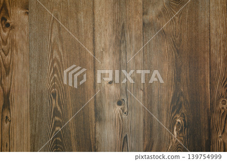 dark texture of noble wood with a beautiful wavy pattern of annual growth rings dark texture of noble wood with a beautiful wavy pattern of annual growth rings 139754999