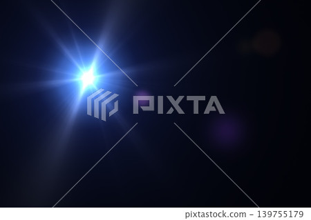 Bright blue lens flare with glowing starburst effect on black background Bright blue lens flare with glowing starburst effect on black background 139755179
