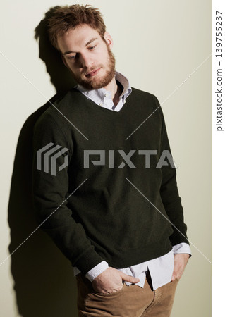 Style, thinking and young man in a studio with classy, elegant and fancy outfit for confidence. Serious, handsome and attractive male person from Australia with fashion isolated by gray background. Style, thinking and young man in a studio with classy, elegant and fancy outfit for confidence. Serious, handsome and attractive male person from Australia with fashion isolated by gray background. 139755237