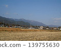 A spring landscape with rice paddies 139755630