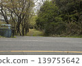 A road surrounded by trees 139755642