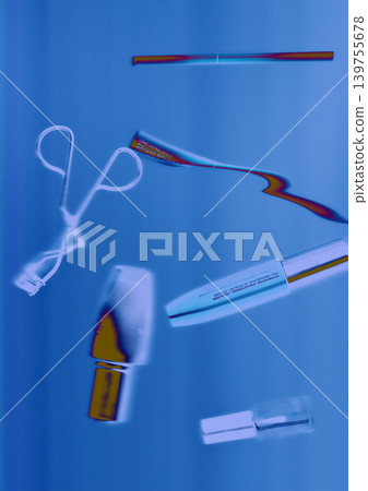 Cosmetic tools and beauty products in blue neon light, underwater. Modern aesthetic of biotechnology, aesthetics, and high-tech skincare innovation. Cosmetic tools and beauty products in blue neon light, underwater. Modern aesthetic of biotechnology, aesthetics, and high-tech skincare innovation. 139755678