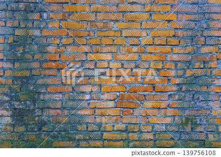 Moss and algae dispersing across ancient bricks creating grunge and nature reclamation visual Moss and algae dispersing across ancient bricks creating grunge and nature reclamation visual 139756108