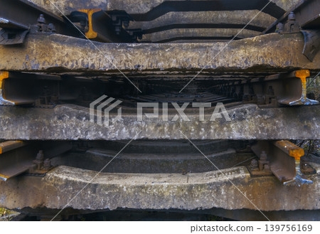 Encrusted rusted metal elements emphasizing mechanical details and structural components in aged steel plates 139756169
