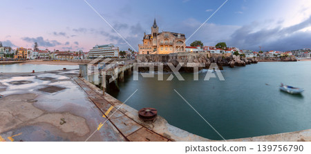 Historic waterfront building and small boat in Cascais Portugal at dusk Historic waterfront building and small boat in Cascais Portugal at dusk 139756790