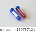 Laboratory sample tubes for virus diagnostics and infectious disease testing. Medical composition for healthcare research, biological analysis and pathogen detection concepts. Place for text on label 139757121