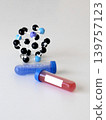 Laboratory test tube with molecular model for virus research and infectious disease diagnostics. Healthcare concept for scientific analysis, medical testing and biotechnology studies, chemistry 139757123