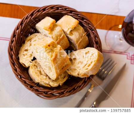 Sliced bread served on wicker plate Sliced bread served on wicker plate 139757885