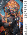 Nepali people worship to the Kaal Bhairav shrine in Kathmandu Durbaq Square. Kaal Bhairav is believed to be a frightening incarnation of Lord Shiva. 139757895
