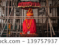 A statue of Hanuman (monkey god), dated to 1672, guards the palace in Kathmandu Durbar square, Nepal.  139757937