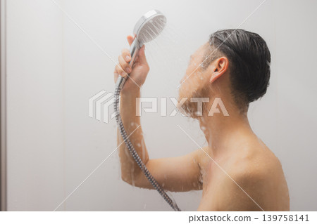 Men taking a shower Men taking a shower 139758141
