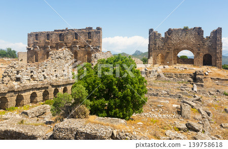 Ruins of Nymphaeum and Bazilika of ancient city Aspendos. Turkey 139758618