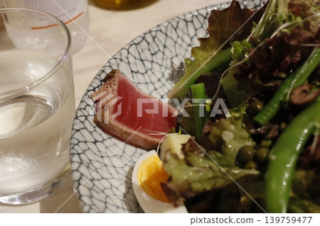 Seared Tuna with Fresh Salad and Water Glass Seared Tuna with Fresh Salad and Water Glass 139759477