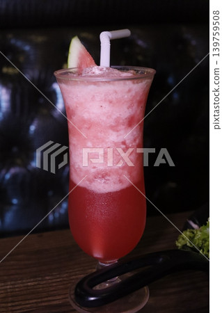 Pink Fruit Smoothie in Glass with Straw 139759508