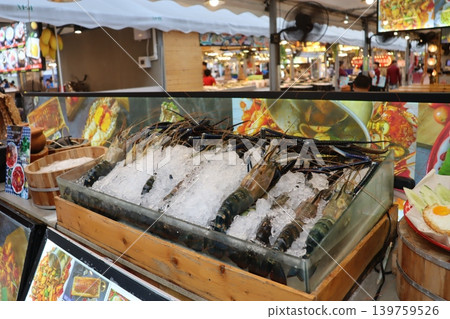 Fresh Prawns on Ice at Vibrant Seafood Market Stall Fresh Prawns on Ice at Vibrant Seafood Market Stall 139759526