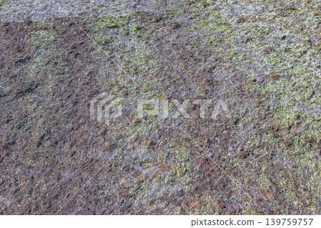 Stone rock texture with green moss and lichen in Brazil. Stone rock texture with green moss and lichen in Brazil. 139759757