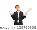 A woman with documents and a red pen, looking troubled. 139760308
