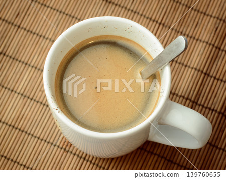 Tasty instant coffee with a lot of foam. Making coffee Tasty instant coffee with a lot of foam. Making coffee 139760655