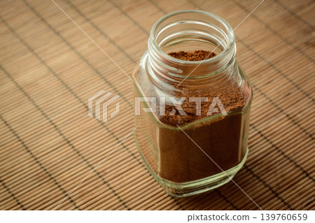 Jar of instant coffee on table Jar of instant coffee on table 139760659