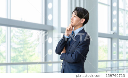 A male businessman thinking 139760713
