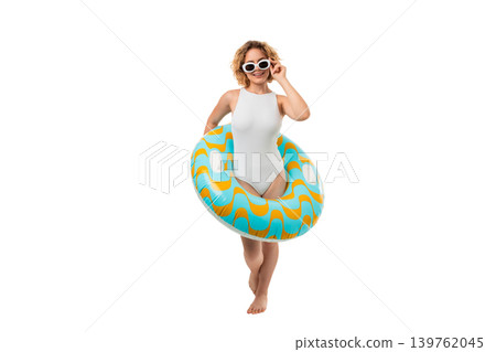 Girl in swimsuit holds inflatable ring and smiles, PNG Girl in swimsuit holds inflatable ring and smiles, PNG 139762045