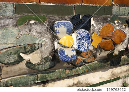 Wat Arun, Bangkok, Thailand: Ceramic decorations on the large stupa. Wat Arun, Bangkok, Thailand: Ceramic decorations on the large stupa. 139762652