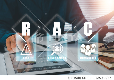 Business professional reviewing risk assessment data on a digital tablet, emphasizing analysis and decision-making. Business professional reviewing risk assessment data on a digital tablet, emphasizing analysis and decision-making. 139762727