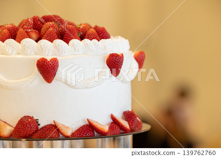 A picture of a big cream cake with lots of strawberries on top Wedding cake A picture of a big cream cake with lots of strawberries on top Wedding cake 139762760