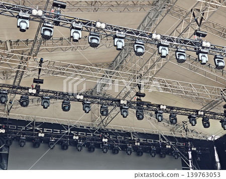Professional stage lighting rig with moving head spotlights 139763053