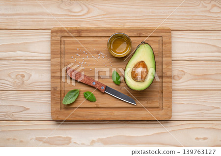 Avocado cooking ingredients wooden cutting board Avocado cooking ingredients wooden cutting board 139763127