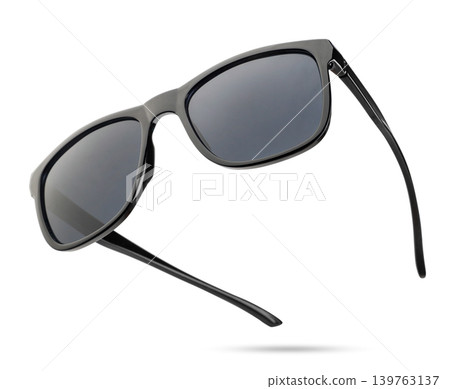 Black sunglasses flying on a white background. Isolated Black sunglasses flying on a white background. Isolated 139763137
