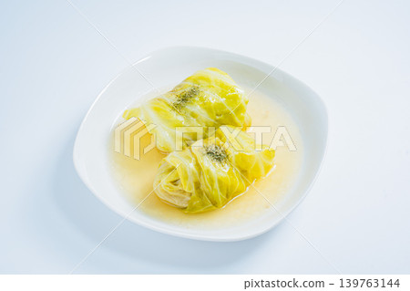 Cabbage rolls on a white background Cabbage rolls on a white background 139763144