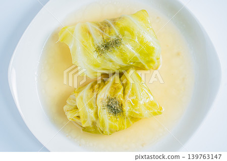 Cabbage rolls on a white background Cabbage rolls on a white background 139763147