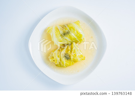 Cabbage rolls on a white background Cabbage rolls on a white background 139763148