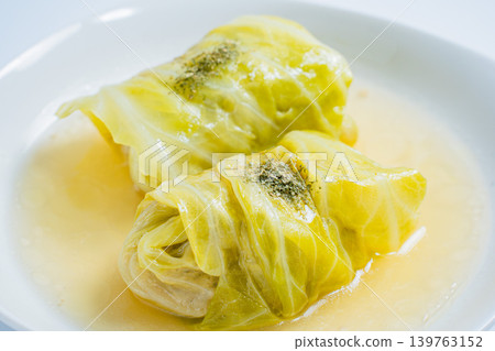 Cabbage rolls on a white background Cabbage rolls on a white background 139763152