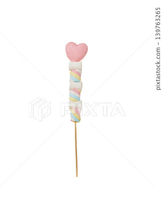 Colorful marshmallow sticks with heart-shaped marshmallows - cutout on a white background Colorful marshmallow sticks with heart-shaped marshmallows - cutout on a white background 139763265