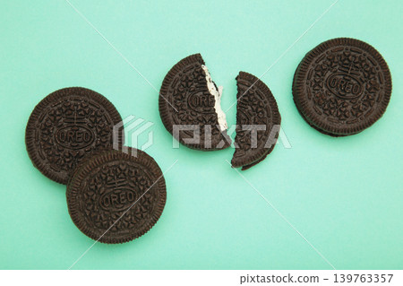Mykolaiv, Ukraine - April 25, 2026: Oreo Cookies on mint background. Mykolaiv, Ukraine - April 25, 2026: Oreo Cookies on mint background. 139763357