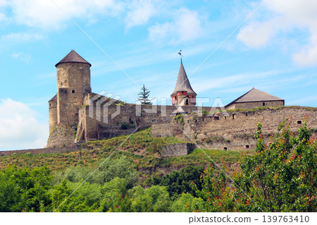 Medieval castle in Kamyanets-Podilskyi with views of high stony walls 139763410