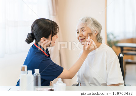 Senior women receiving care beauty, visiting beauty, and makeup therapy at a nursing home Senior women receiving care beauty, visiting beauty, and makeup therapy at a nursing home 139763482