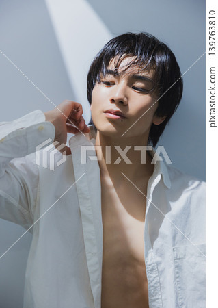 man in white shirt man in white shirt 139763810