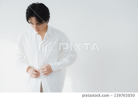 man in white shirt man in white shirt 139763850